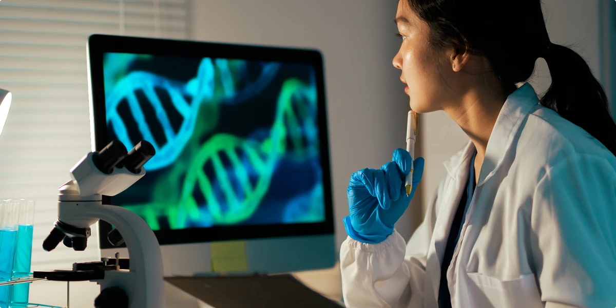 Physician analyzing DNA data and longevity biomarkers through advanced lab testing to assess metabolic health and biological age